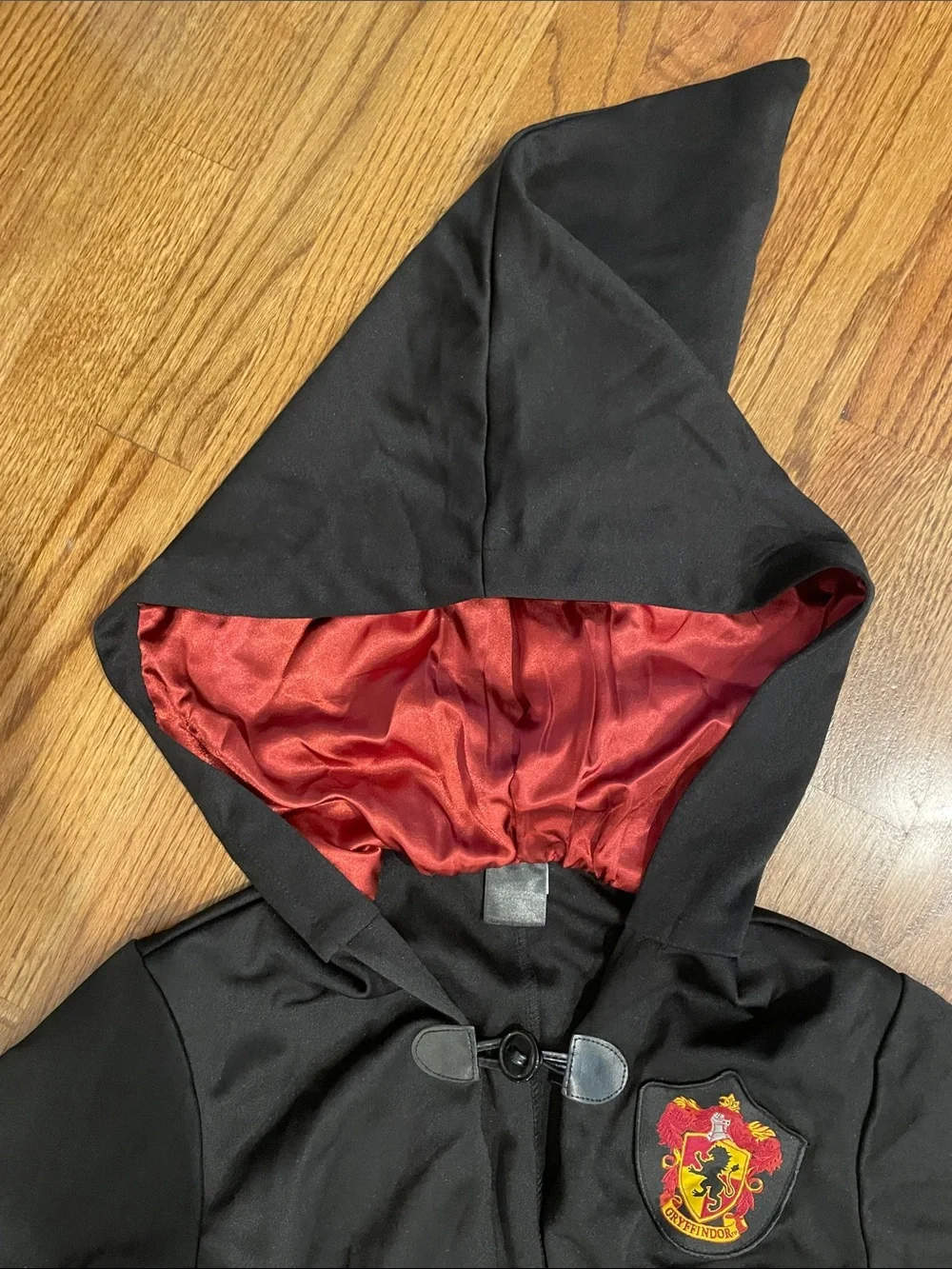 Harry Potter Spirit Black Hooded Coat with Red Lining and Gryffindor Crest youth
